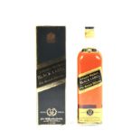 A boxed bottle of Johnnie Walker Black label twelve year old whisky.