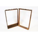 Two hand made stained wood sporting equipment racks.