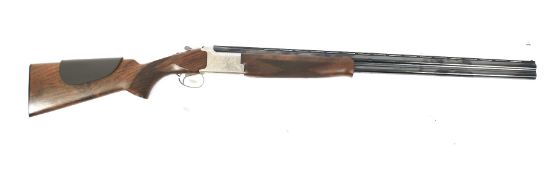 A Miroku MK-60 sport 12 gauge shotgun. 30inch barrel, 2 3/4 inch chambers. 1/4 and 3/4 choke.