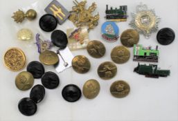 An assortment of buttons and badges.