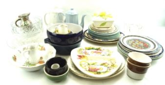 An assortment of mixed ceramics and glass. Including plates, dishes, footed glass bowls, etc.