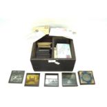 A collection of glass negatives, magic lantern slides and colour transparencies.