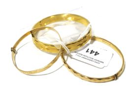 Three 9ct rolled gold bangles.