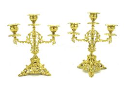 A pair of gilt candelabra.