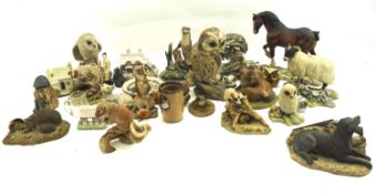 A large assortment of resin and ceramic animals. By Border Fine Arts, Avonvale, etc.
