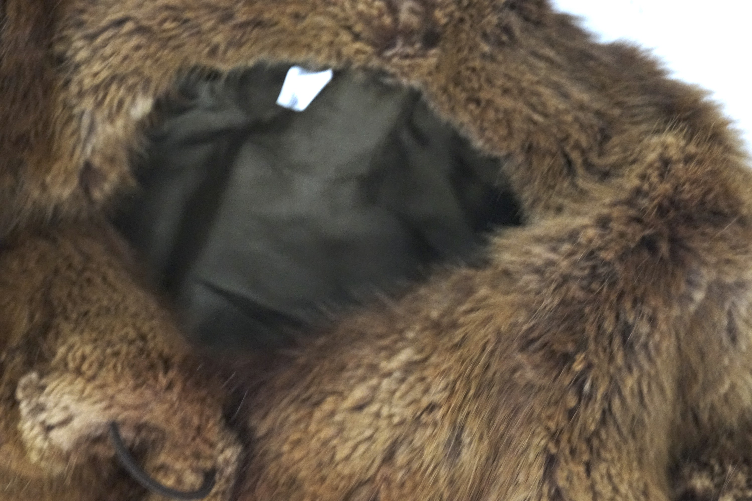 A long brown fur coat, lined. - Image 2 of 2