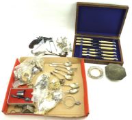 A boxed knife set and other metal items. Including drawer handles, flatware, etc.