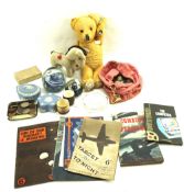 An assortment of collectables. Including soft toys, paperweights, playing cards, etc.