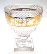 A large cut and gilt glass footed bowl.