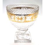 A large cut and gilt glass footed bowl.