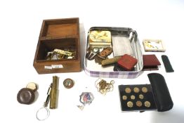 An assortment of collectables. Including a trophy, coins, cufflinks, etc.