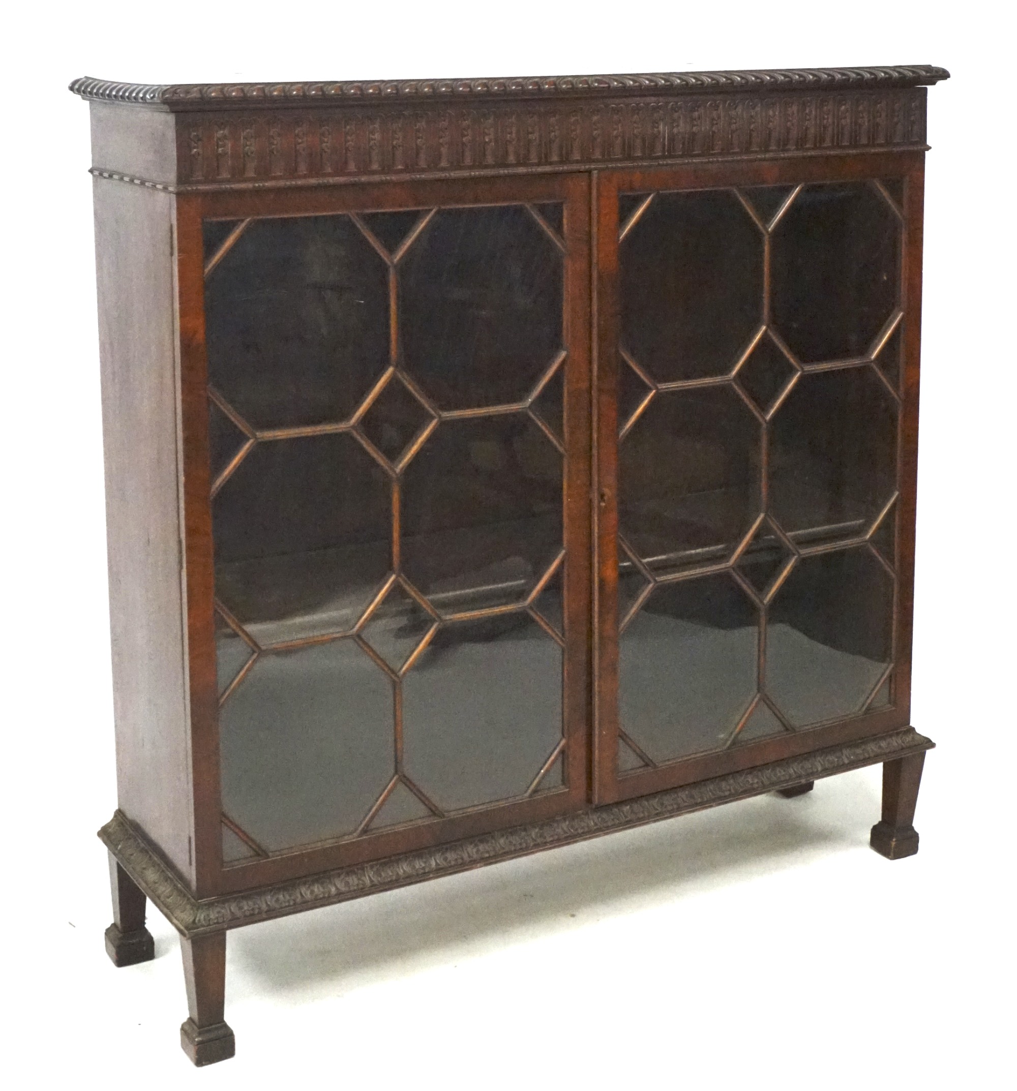 A 20th century mahogany veneered display cabinet.