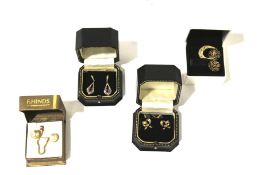 A collection of 9ct gold and yellow metal ladies earrings.