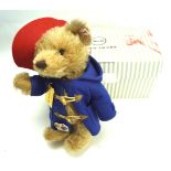 A contemporary limited edition Steiff 60th Anniversary Paddington Bear.