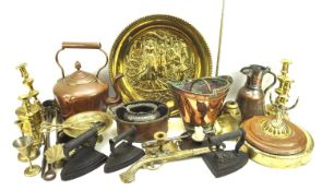 A quantity of metalware. Including brass and copper, kettle, bucket, charger, candlesticks, etc.