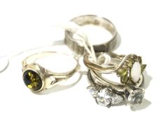 Five ladies' silver rings. Some set with semi-precious stones and others with engraved details, 12.