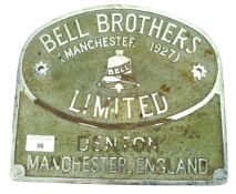 A vintage Bell Brothers cast metal sign.