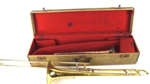 Two brass instruments and music books. Comprising a Zenith trumpet no.