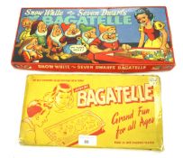 Two vintage bagatelle board games.