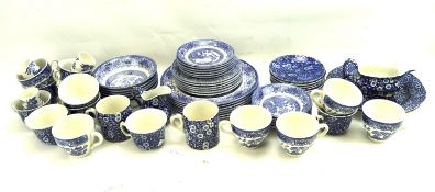 Two part tea services in blue and white.