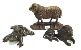 Three cast metal animals. Comprising a frog, lion and a sheep doorstop, doorstop H18.