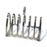 A George V silver toast rack.