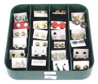 Twenty-four pairs of contemporary ladies' earrings.