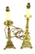 Two brass candlesticks.