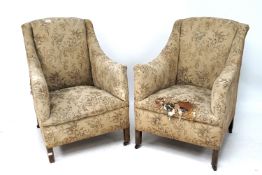 A pair of 20th century armchairs.