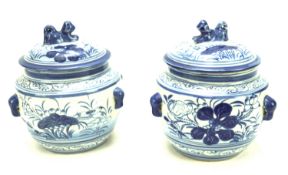 A pair of contemporary Chinese lidded pots.