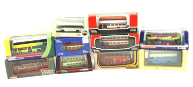 An assortment of diecast buses and coaches.