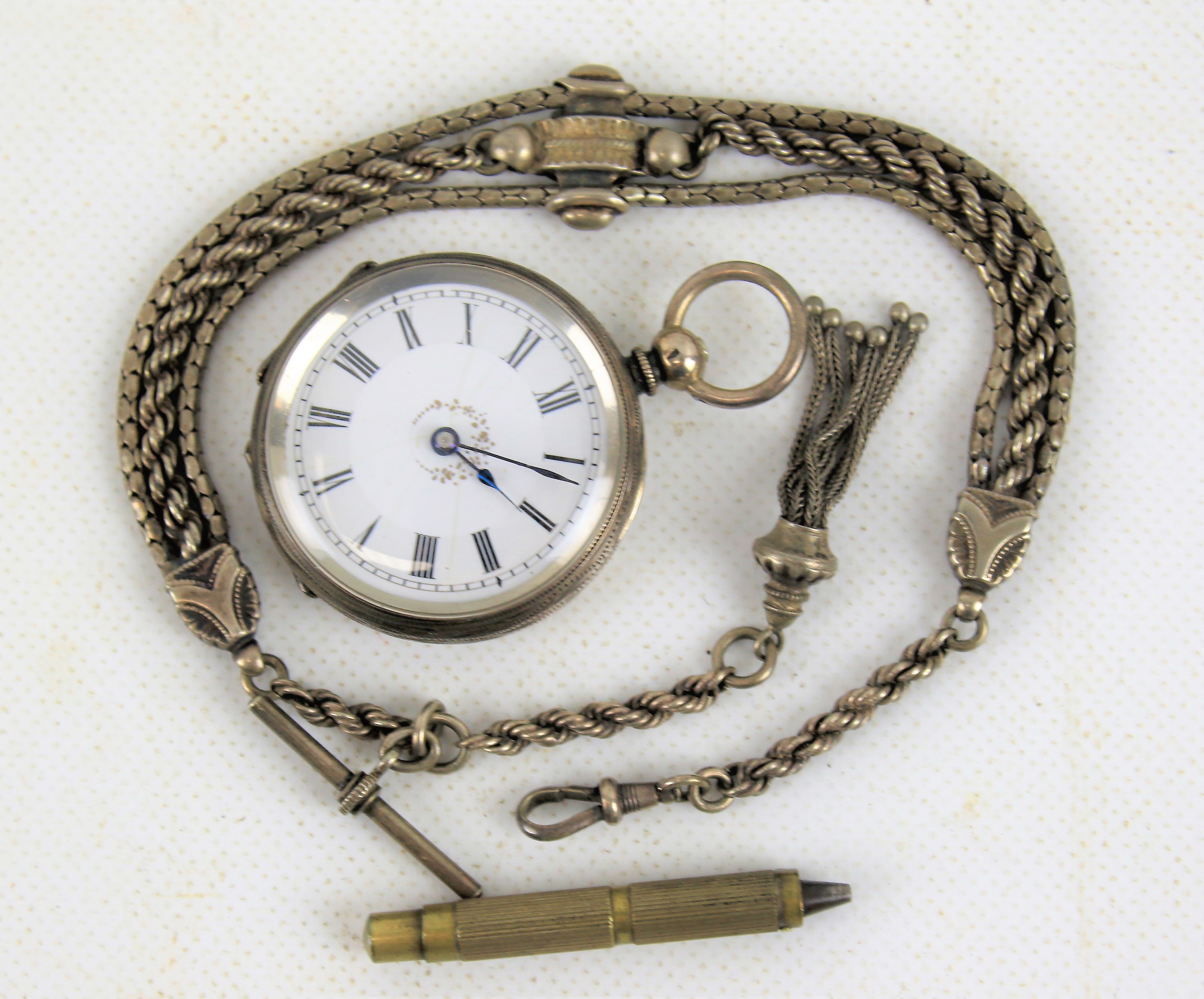 A continental silver fob watch and chain.