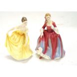 Two Royal Doulton figures.