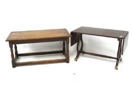 A 20th century drop leaf table and an oak coffee table.