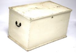 A 19th century white painted pine storage trunk.
