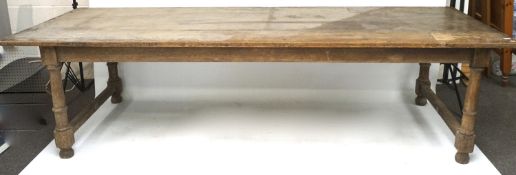 A 19th century plank top refectory table.