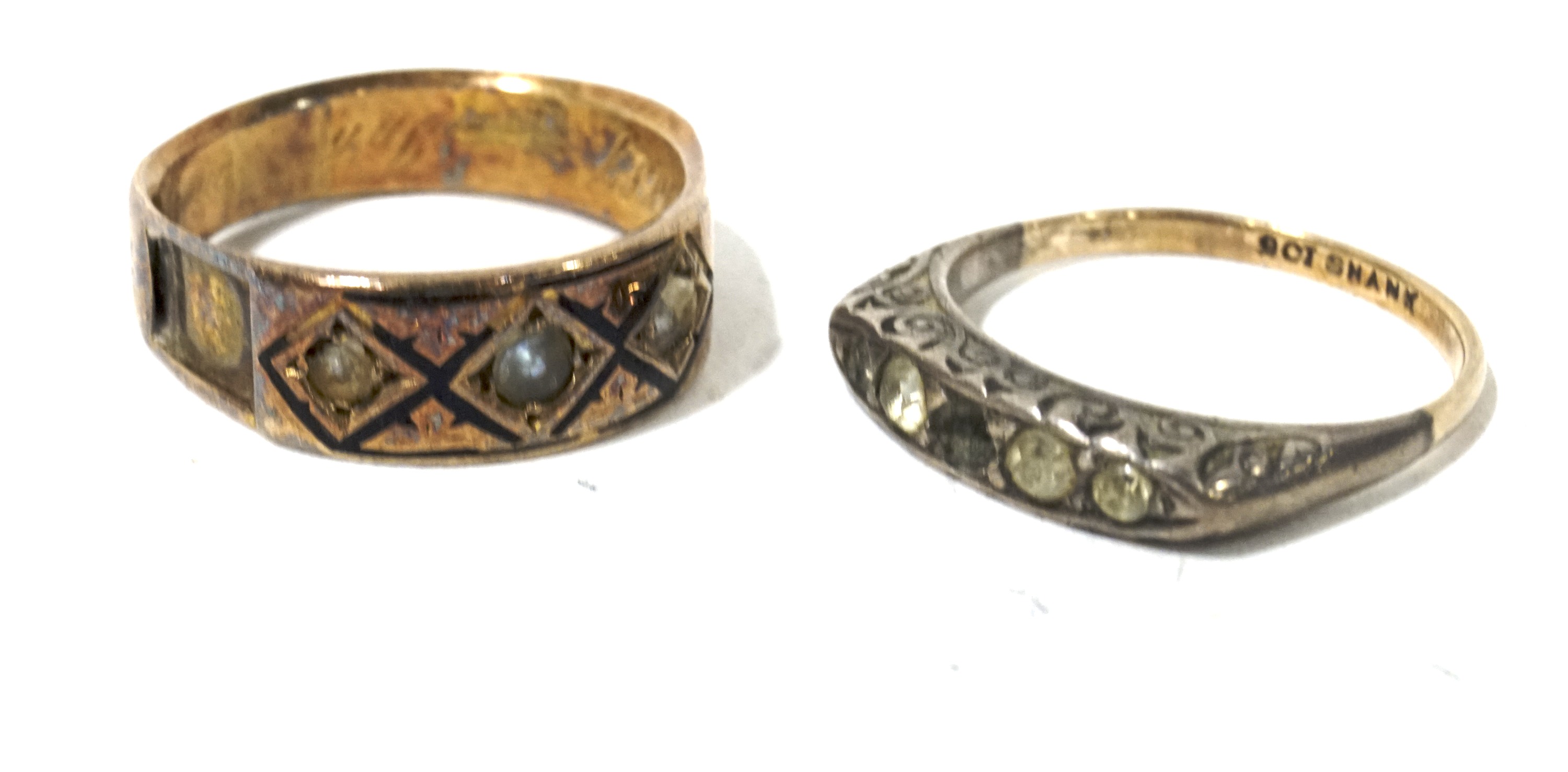 A Victorian yellow metal mourning ring and a yellow metal five stone ring.