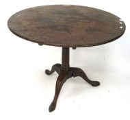 A 19th century mahogany circular tilt top table.