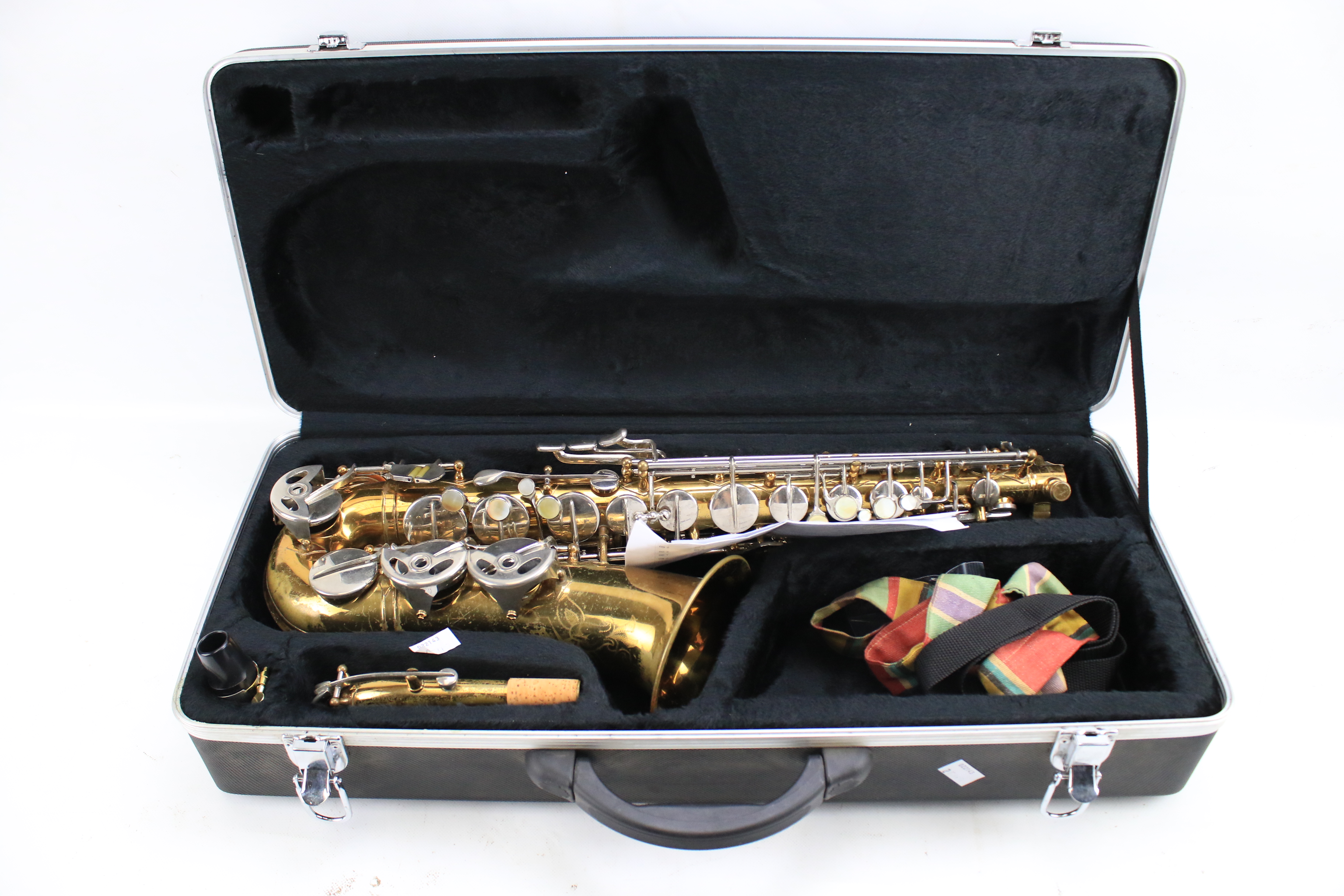 A Velvetone Alto saxophone. No.
