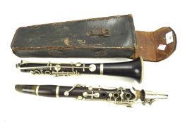 A Hawkes & Sons clarinet.