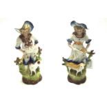 Ceramic shepherd and shepherdess figures.