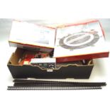 An assortment of OO gauge track and accessories.
