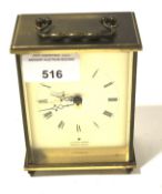 A Junghans carriage clock.