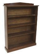 A 20th century mahogany open bookcase.