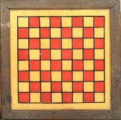 An Edwardian hand painted glass chess board. Set in a rectangular oak frame, 37.5cm x 37.