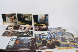 A collection of James Bond lobby cards.