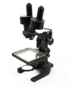 A Spencer Buffalo cased microscope.
