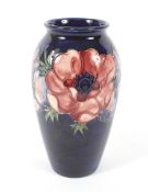 A Moorcroft Anemone Pattern balluster shaped vase. Sighen to the base in blue, H18cm.