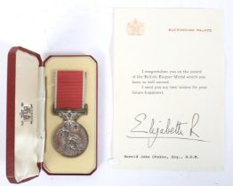 An Elizabeth II British Empire medal, with case and certificate.