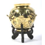 A 20th century Chinese gilt bronze vase on stand.